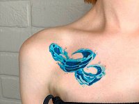 Тату волна на ключице