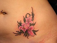 Тату розовые цветы