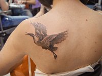 небольшая татуировка журавль