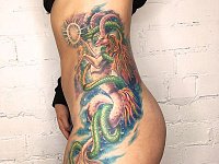 Тату козерог на боку