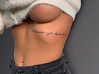 Надпись под грудью the darkest night before down