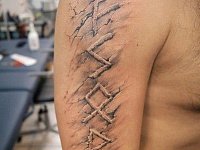 татуировка руны