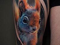 Тату белка на ноге