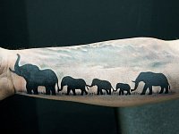 Тату семья слонов