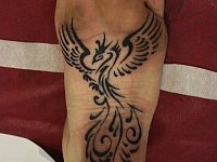 Тату на стопе феникс