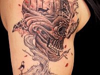 Тату череп сюрреализм