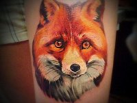Тату лисицы на ноге