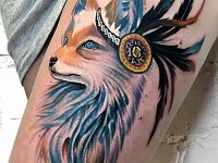 Тату лиса на бедре