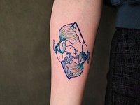 Тату рыбки в ромбе