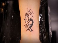 тату кокопелли